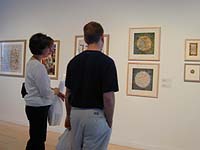 Two people viewing Music World I and II