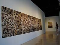 Two People Viewing Rima's Wall