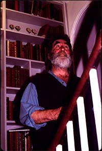 Tom with books at 57 Talfourd Rd.